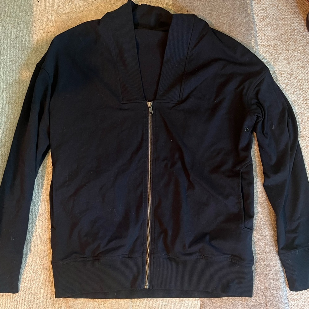 LULULEMON Black, Stretchy - Lycra material, relaxed fit zip up Jacket Size 10?